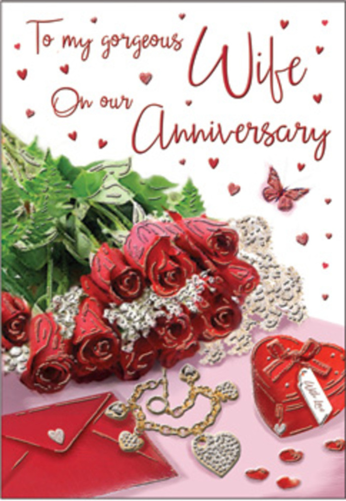 A romantic anniversary composition is carefully staged in this card design, echoing the warmth of long, shared years in Dollis Hill homes. A bouquet of classic red roses, each bloom fully open and richly layered, spreads across the scene with a sense of gentle movement, as though the flowers have just been set down after arriving from Dollis Hill Flowers. The petals appear almost touchable, with subtle highlights along their edges and deeper shadows within the hearts of the blooms, capturing that lush, velvety texture only fresh roses possess. Threads of greenery and small leaves weave between the blossoms, giving the arrangement a natural fullness reminiscent of a hand-tied bouquet carried back from a stroll near Gladstone Park. Nestled beside the roses is an elegant envelope, its fold crisp and inviting, accompanied by a small jewellery piece and a heart-shaped keepsake box that might hold tiny treasures or a cherished ring. Scattered across the background are miniature hearts and delicate sparkles, positioned like confetti from a quiet celebration at home. A single butterfly motif appears poised in mid-flight, light and carefree, as if drawn by the floral scent. The lighting is soft and even, with gentle reflections that lend a polished yet intimate feel. Scripted words curve through the centre of the design, not fully legible but clearly affectionate, guiding the eye past each sentimental detail. The overall effect is one of enduring tenderness and quiet joy, perfectly fitting for couples in Dollis Hill marking another year of love with flowers, keepsakes and heartfelt messages.