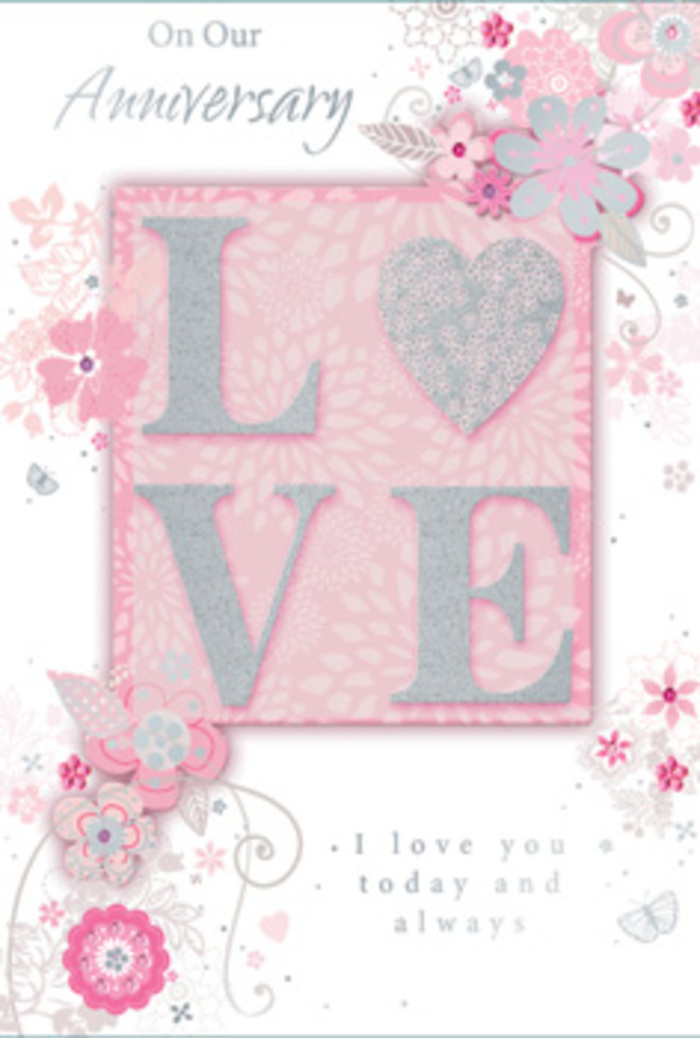 An intimate, beautifully detailed anniversary card is shown from the front, its surface glowing with soft pastel tones that evoke armfuls of fresh flowers carried home along Dollis Hill Broadway. At the centre, the word LOVE stands proud in large, embossed capitals, each letter brushed with a fine layer of frosted glitter. This glitter is more pearlescent than bright, giving off a subdued shimmer similar to moonlight glancing off pale rose petals. The raised texture suggests a gentle, tactile experience, encouraging the fingertips to linger in the same way one might pause over the velvety feel of a bloom. Encircling this central word, a profusion of hand-drawn flowers and elegant leaves spills outward, like a floral border framing a favourite photograph. The blossoms vary in size and style: some are rounded and full, with soft blush and ivory shading, while others are more open and airy, expressed in delicate grey linework and silvery accents. Wisps of vines and small curving tendrils weave between the flowers, forming sweeping arcs that guide the eye from top to bottom and side to side. Tiny details - a subtle swirl here, an almost hidden bud there - give the card the same thoughtful craftsmanship you would expect from a local artisan florist. Behind it all, the background glows with a gentle pink wash, slightly deeper near the centre and paler at the edges, evoking warmth and affection. Inside, the printed message speaks of love that endures today and always, rendered in a graceful script that feels personal rather than formal. The entire composition conveys quiet celebration and gratitude, making this card feel like a paper bouquet designed for a cherished anniversary in Dollis Hill.